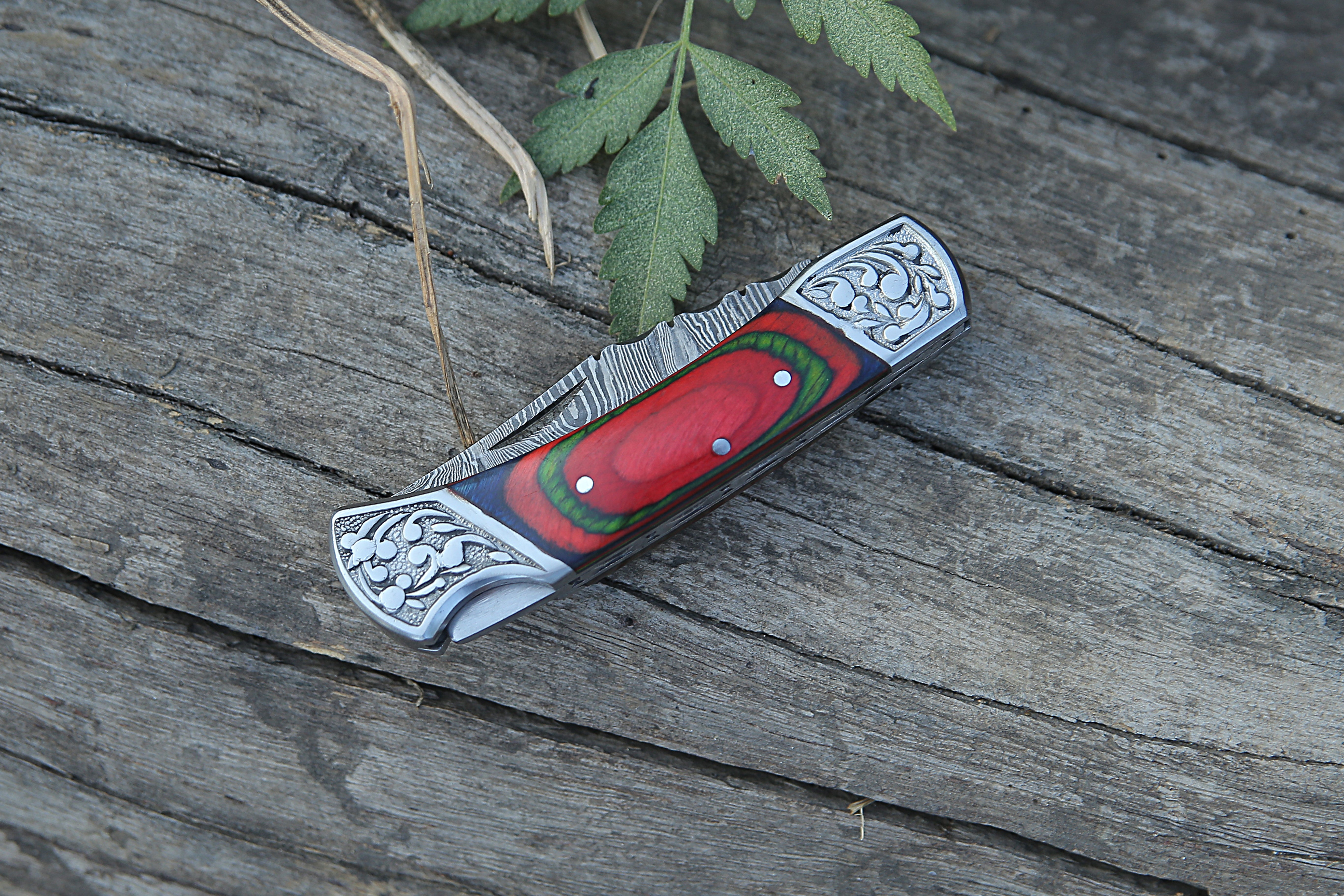 Back Lock Handmade Damascus Steel Pocket Knife Multicolor Pakka Wood Handle Folding Knife With Engraved Steel clips.