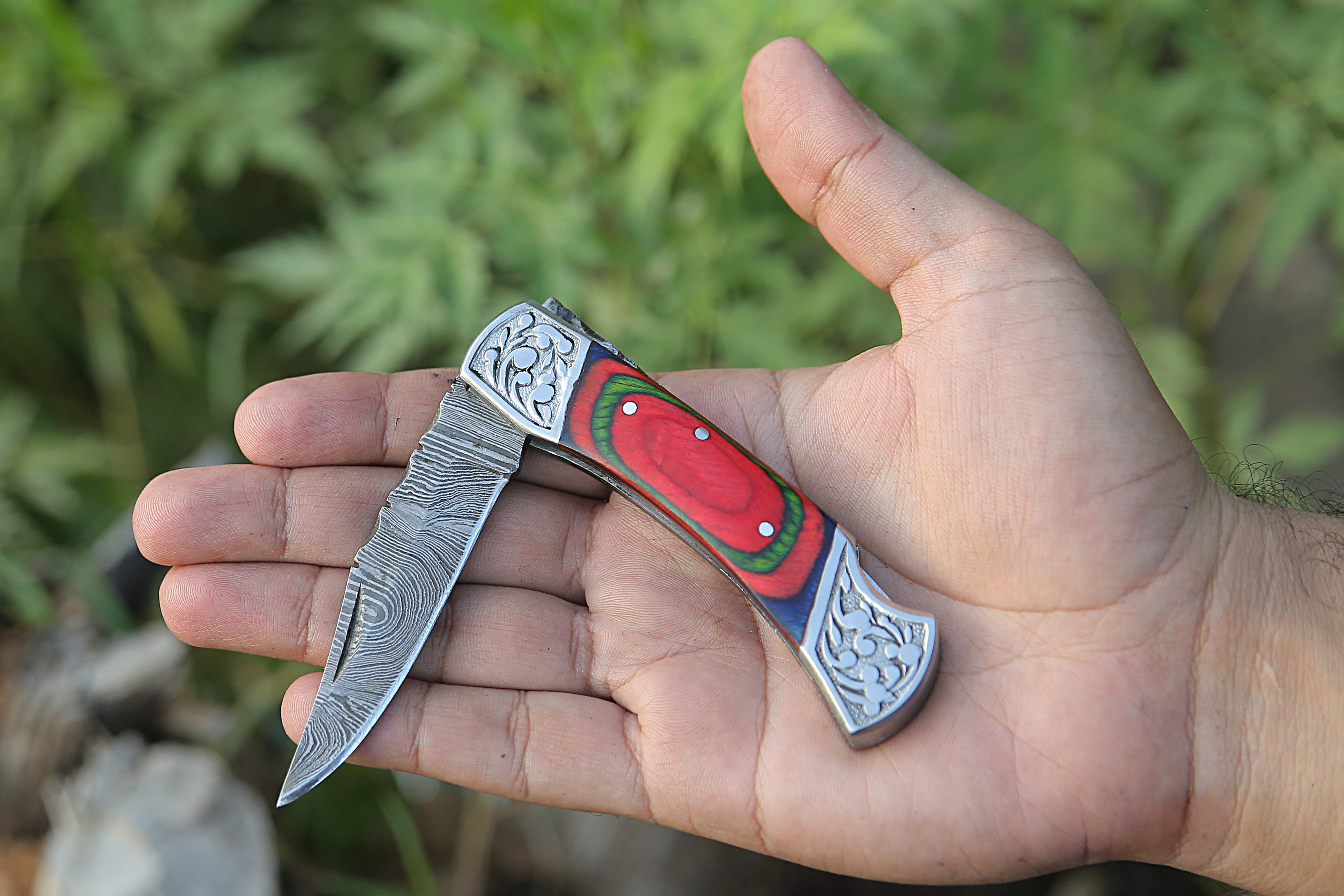 Back Lock Handmade Damascus Steel Pocket Knife Multicolor Pakka Wood Handle Folding Knife With Engraved Steel clips.