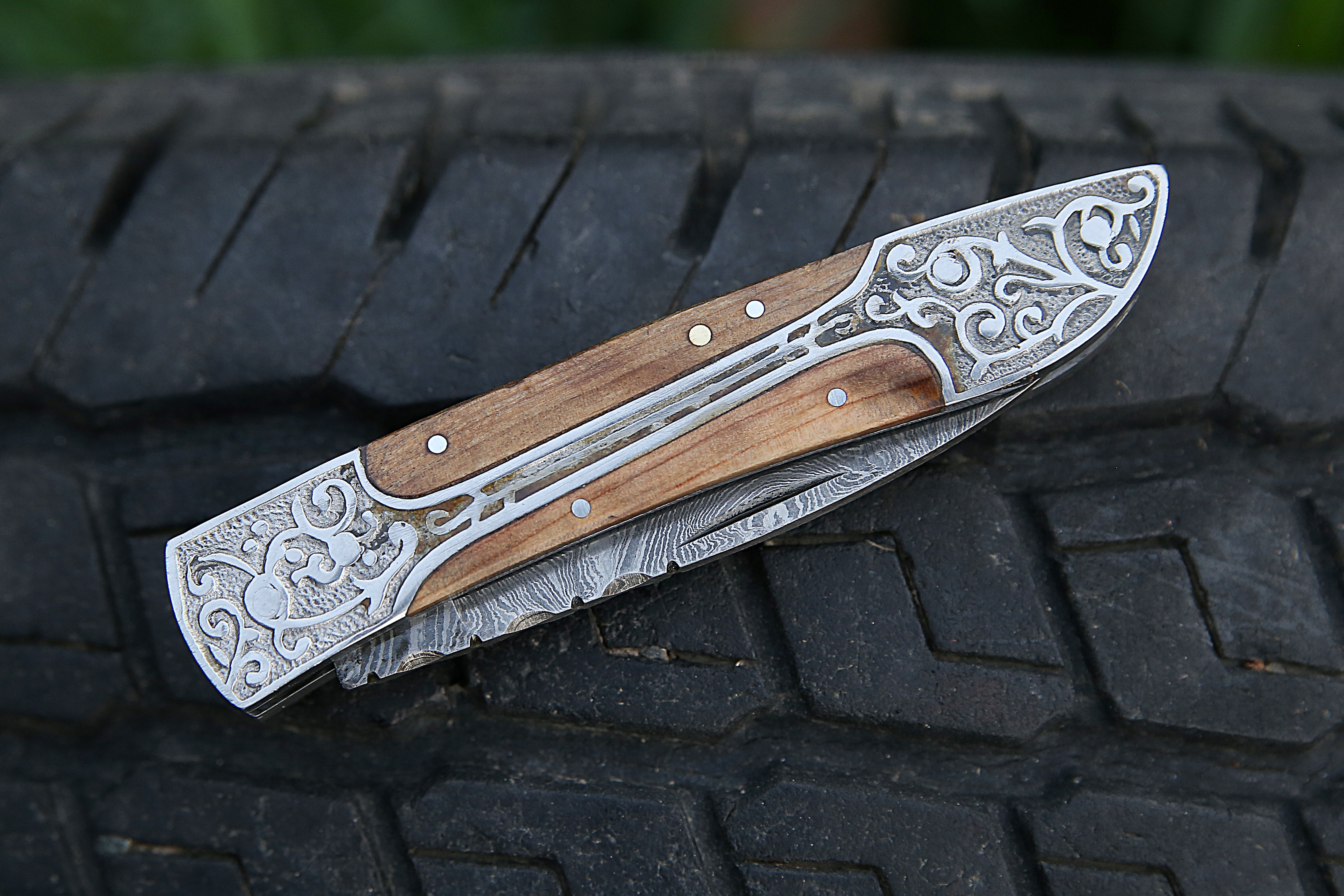 Handmade Damascus Steel Folding Knife With Engraved Steel Frame Olive Wood Handle Pocket Knife.